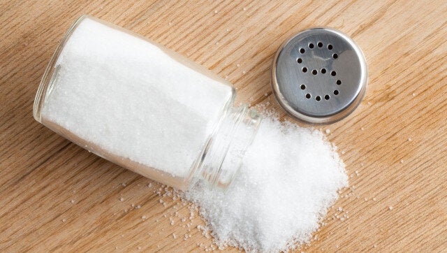 salt shaker on wooden table