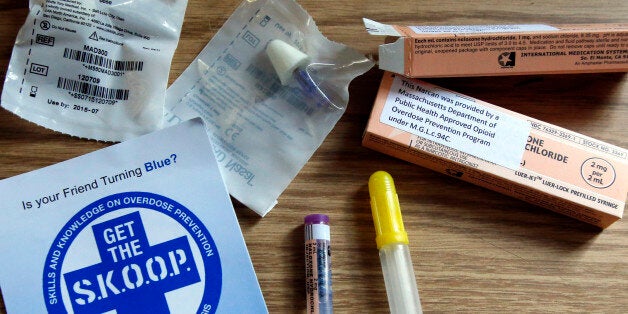 An educational pamphlet and samples of naloxone, a drug used to counter the effects of opiate overdose, are displayed at a news conference at the fire station in Taunton, Mass., Monday, Feb. 24, 2014. A recent surge in heroin overdoses in Taunton has shed light on an epidemic that has plagued the state and nation. At the news conference, Massachusetts Senator Edward Markey outlined a three-pronged plan to address the opiate drug epidemic, calling for expansion of naloxone programs for first responders and bystanders, greater access to proven addiction treatments and modernizing Americaâs addiction treatment system. (AP Photo/Elise Amendola)