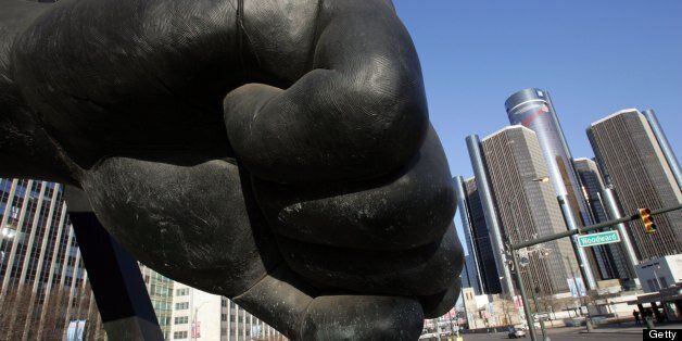 DETROIT - JANUARY 26: The Spirit of Detroit Statue, a scale casting of Joe Louis' fist, welcomes visitors to Detroit as it rests at the intersection of Woodward Avenue and Jefferson Avenue facing Windsor, Ontario, January 26, 2006 in Detroit, Michigan. Detroit will host Super Bowl 40 (XL) on February 5. (Photo by Fabrizio Costantini/Getty Images)