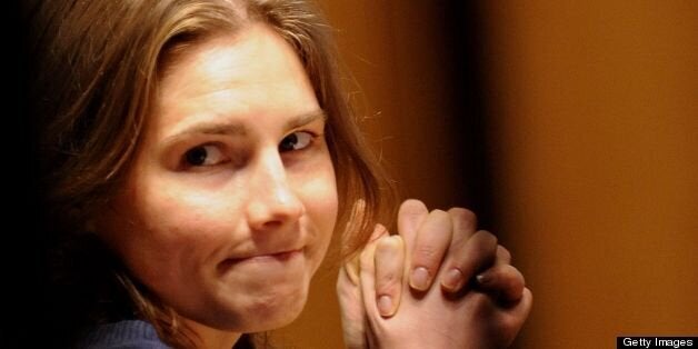 (FILES) This file picture taken on March 12, 2011 shows US Amanda Knox takes place in court before the start of a session of