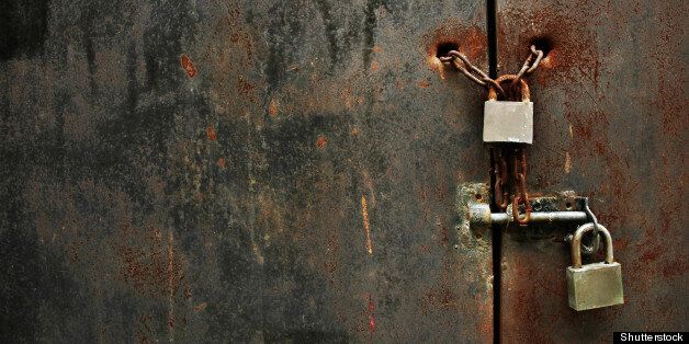 lock on rusty iron door