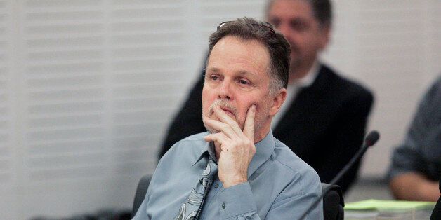 Chase Merritt listens during his trial, Monday, June, 15, 2015 in San Bernadino, Calif. Merritt is accused of killing four members of the McStay family in February 2010. A judge will decide whether Merritt, 58, must stand trial for the deaths of his business partner, Joseph McStay, the man's wife and their two young sons. (John Gibbins/U-T San Diego via AP, Pool)
