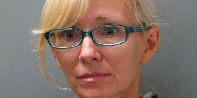 FILE - In this undated file photo provided Wednesday, Nov. 5, 2014 by the Delaware State Police, Molly Shattuck, of Baltimore, poses for a police mug shot. The former Baltimore Ravens cheerleader charged with raping a teenage boy and providing other minors with alcohol is set for a court hearing Wednesday Jan. 7, 2015. (AP Photo/Delaware State Police, File)