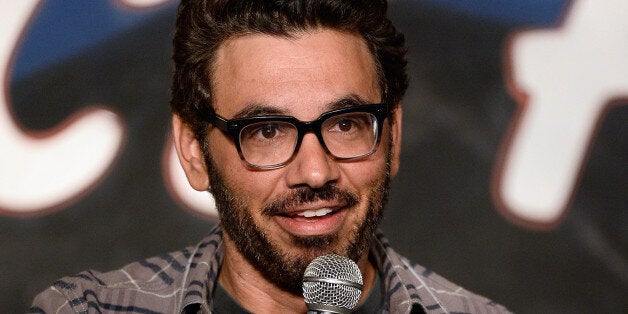 PASADENA, CA - JULY 18: Comedian Al Madrigal performs during his appearance at The Ice House Comedy Club on July 18, 2014 in Pasadena, California. (Photo by Michael Schwartz/WireImage)