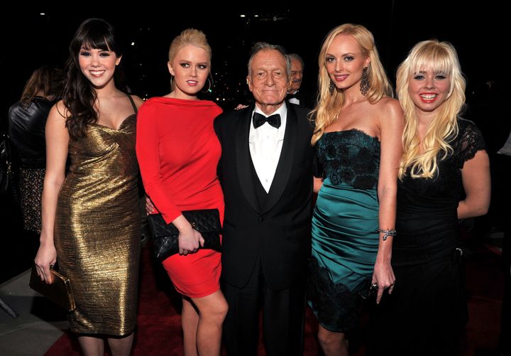 LOS ANGELES, CA - FEBRUARY 10: Hugh Hefner (C) and guests arrive at The 2012 MusiCares Person of The Year Gala Honoring Paul McCartney at Los Angeles Convention Center on February 10, 2012 in Los Angeles, California. (Photo by Lester Cohen/WireImage)