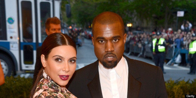 NEW YORK, NY - MAY 06: Kim Kardashian and Kanye West attend the Costume Institute Gala for the 'PUNK: Chaos to Couture' exhibition at the Metropolitan Museum of Art on May 6, 2013 in New York City. (Photo by Kevin Mazur/WireImage)