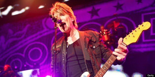 UNIVERSAL CITY, CA - JULY 17: John Rzeznik (lead singer) and the Goo Goo Dolls perform at Gibson Amphitheatre on July 17, 2013 in Universal City, California. (Photo by Earl Gibson III/WireImage)