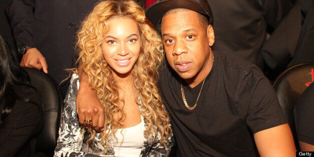 HOUSTON, TX - FEBRUARY 17: Recording artists Jay Z and Beyonce pose for a photo during the 2013 NBA All-Star Game during All Star Weekend on February 17, 2013 at the Toyota Center in Houston, Texas. NOTE TO USER: User expressly acknowledges and agrees that, by downloading and or using this photograph, User is consenting to the terms and conditions of the Getty Images License Agreement. Mandatory Copyright Notice: Copyright 2013 NBAE. (Photo by Ray Amati/NBAE via Getty Images)