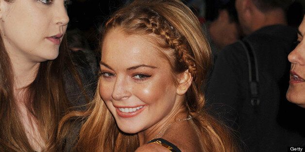 HOLLYWOOD, CA - APRIL 11: Actress Lindsay Lohan arrives at the 'Scary Movie V' Los Angeles premiere atArcLight Cinemas Cinerama Dome on April 11, 2013 in Hollywood, California. (Photo by Jeffrey Mayer/WireImage)