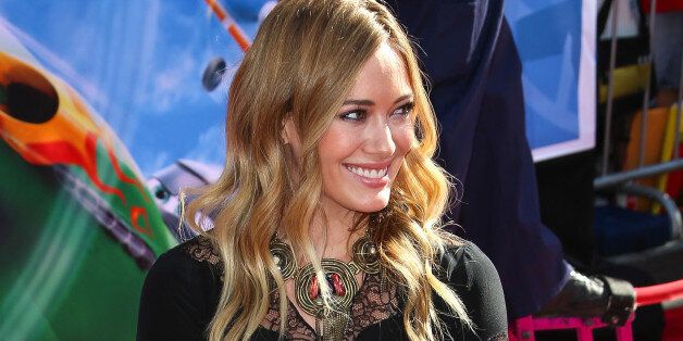 HOLLYWOOD, CA - AUGUST 05: Actress Hilary Duff attends the premiere of Disney's 'Planes' at the El Capitan Theatre on August 5, 2013 in Hollywood, California. (Photo by Imeh Akpanudosen/Getty Images)