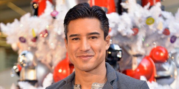 LOS ANGELES, CA - DECEMBER 13: Actor Mario Lopez hosts a tree lighting ceremony at a Nescafe Holiday Pop-Up store at Westfield Century City on December 13, 2013 in Los Angeles, California. (Photo by Michael Tullberg/Getty Images)