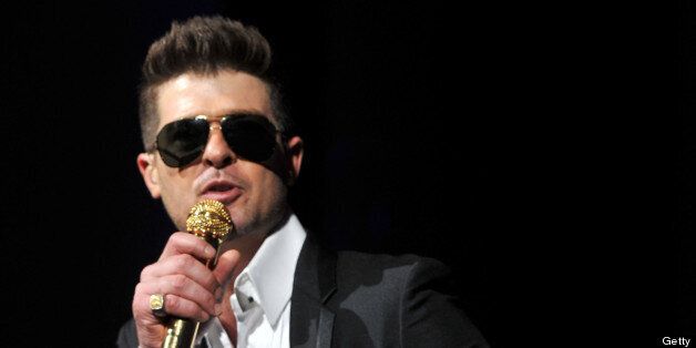 NEW YORK, NY - JUNE 11: Robin Thicke performs on stage during the Samsung's Annual Hope for Children Gala at CiprianiÕs in Wall Street on June 11, 2013 in New York City. (Photo by Kevin Mazur/WireImage)