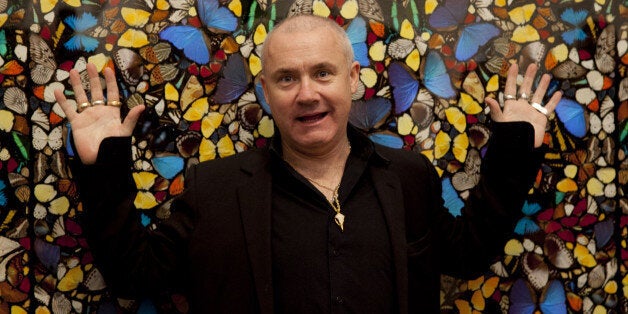 Damien Hirst Poses For Photographers During The Press View Of His Latest Work On Display At The Tate Modern. (Photo by John Phillips/UK Press via Getty Images)