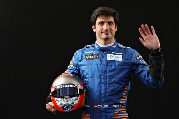 Carlos Sainz of Spain and McLaren F1 poses for a photo in the Paddock during previews ahead of the F1 Grand Prix of Australia at Melbourne Grand Prix Circuit on March 12, 2020 in Melbourne, Australia.