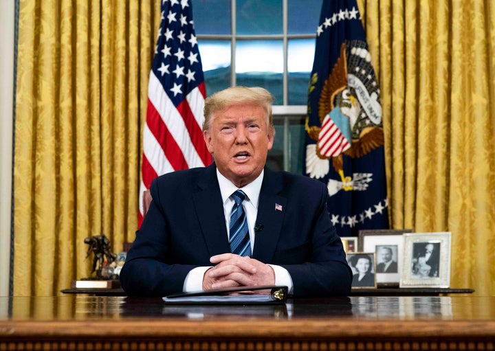 U.S. President Donald Trump addresses the nation from the Oval Office on Wednesday in Washington, D.C. Trump did not include the United Kingdom in his European travel ban. 