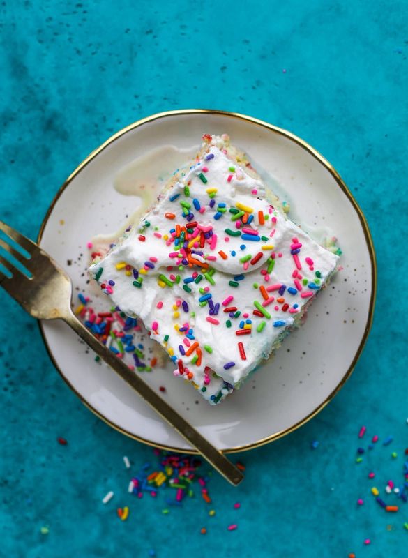 Get the Tres Leches Confetti Cake recipe from How Sweet Eats &nbsp;