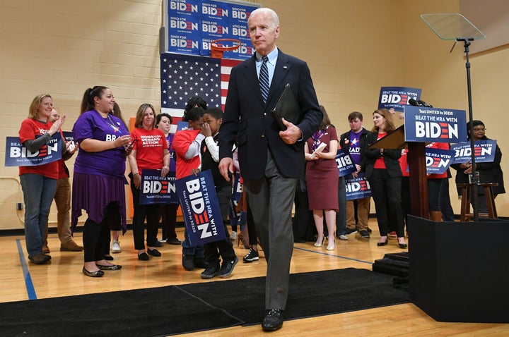 Democratic presidential candidate Joe Biden walks off the stage after speaking during a campaign stop at Driving Park Community Center in Columbus, Ohio, on Tuesday. Biden announced a new campaign manager on Thursday.