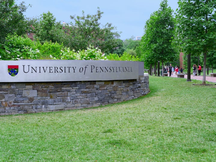 Philadelphia, USA - May 28, 2019: The University of Pennsylvania's campus is very green and shady, as seen in this view along Locust Walk.