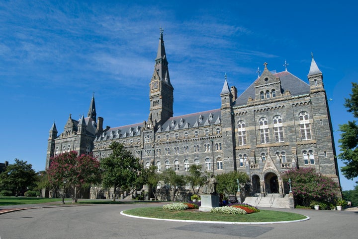 "Washington, USA - July 27, 2011: Front courtyard and main entrance to Healy Hall at the university in Georgetown, Washington. The university was founded in 1789 and is the oldest Catholic university in the United States."