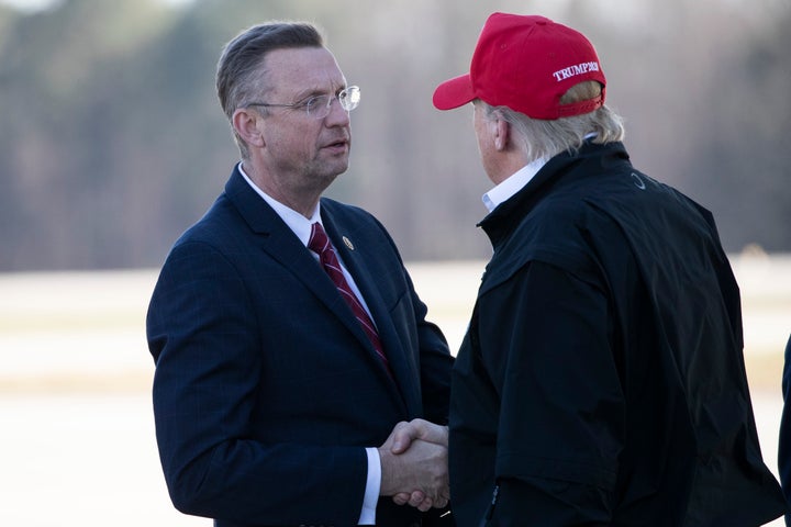 Rep. Doug Collins (R-Ga.) greets President Donald Trump last Friday as Air Force One arrived in Atlanta. Collins later learne