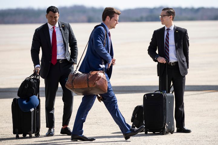 Rep. Matt Gaetz (R-Fla.) exits Air Force One at Andrews Air Force base outside Washington on Monday shortly after learning he had come into contact in late February with same person as Collins' had who tested positive for coronavirus. Gaetz self-quarantined himself from Trump and others during the flight.