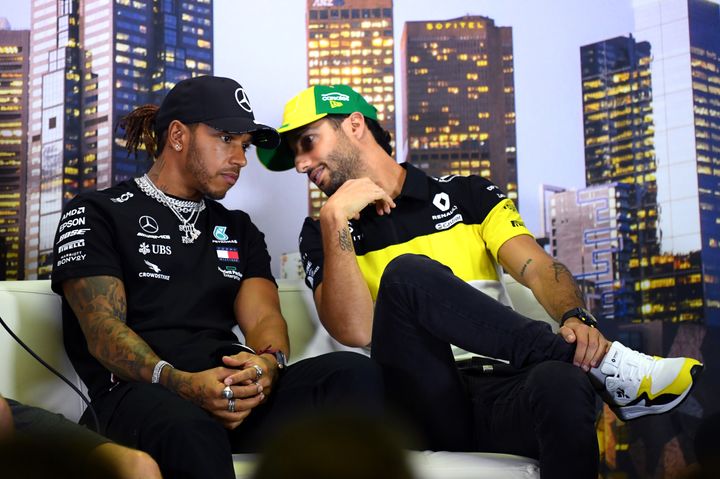 Daniel Ricciardo of Australia and Renault Sport F1 speaks with Lewis Hamilton of Great Britain and Mercedes GP during a press conference during previews ahead of the F1 Grand Prix of Australia at Melbourne Grand Prix Circuit on March 12, 2020 in Melbourne, Australia.