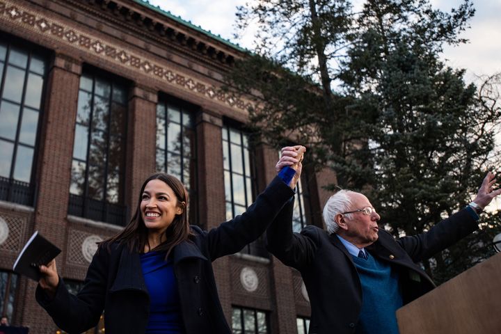 Rep. Alexandria Ocasio-Cortez (D-N.Y.) introduces Sen. Bernie Sanders (I-Vt.) in Ann Arbor, Michigan, on Sunday. It was her first campaign-trail appearance for Sanders in nearly a month.