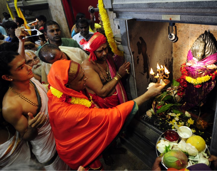 A ceremony takes place inside the Hindu Temple Society of North America in Queens, New York, on July 13, 2009.