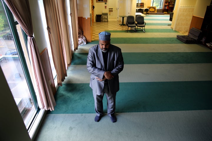 Imam Mohamed Magid prays at the mosque of All Dulles Area Muslim Society (ADAMS) in Sterling, Virginia, on May 19, 2016.