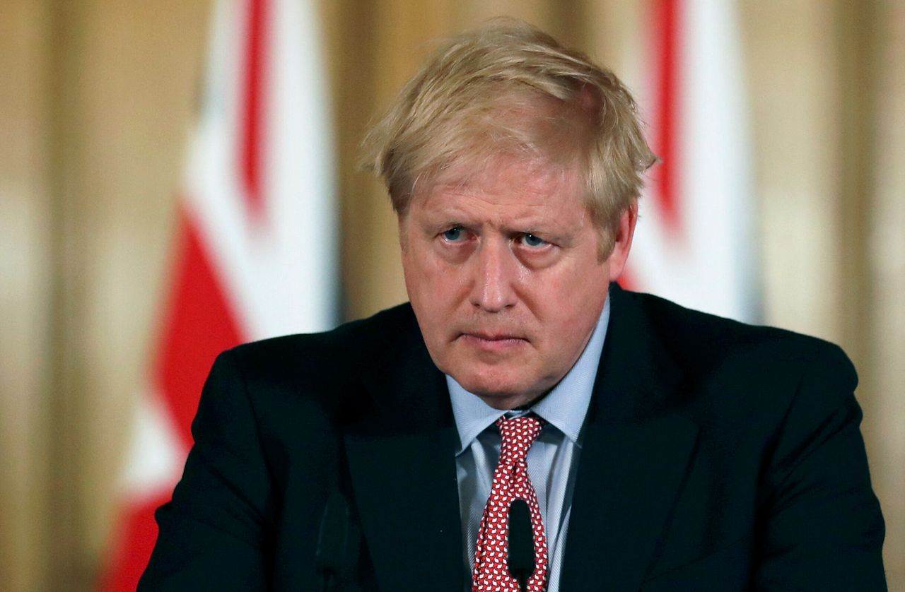 Britain's Prime Minister Boris Johnson holds a news conference to give the government's response to the new COVID-19 coronavirus outbreak, at Downing Street in London, Thursday March 12, 2020. 