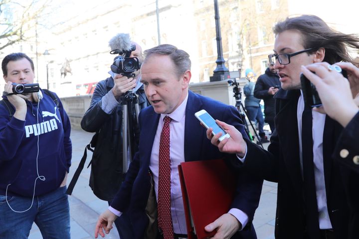 Environment secretary George Eustice arrives at the Cabinet Office, London, ahead of a meeting of the government's emergency committee Cobra to discuss coronavirus.