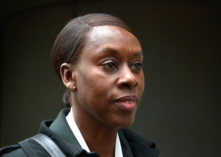 Metropolitan Police Superintendent Novlett Robyn Williams, 54, leaves the Old Bailey in London, where she denied one count of corrupt or other improper exercise of police powers and privilege by a constable, and one count of possessing an indecent photograph of a child.