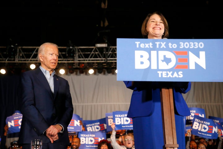 Sen. Amy Klobuchar joins former Vice President Joe Biden on stage during a campaign event in Texas ahead of the Super Tuesday
