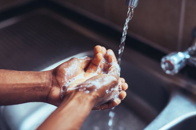 Experts say to wash your hands with soap and water, avoid touching your face, practice social distancing, and disinfect surfaces. 