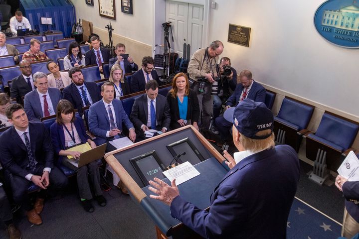 President Donald Trump speaks in the press briefing room at the White House on Saturday.