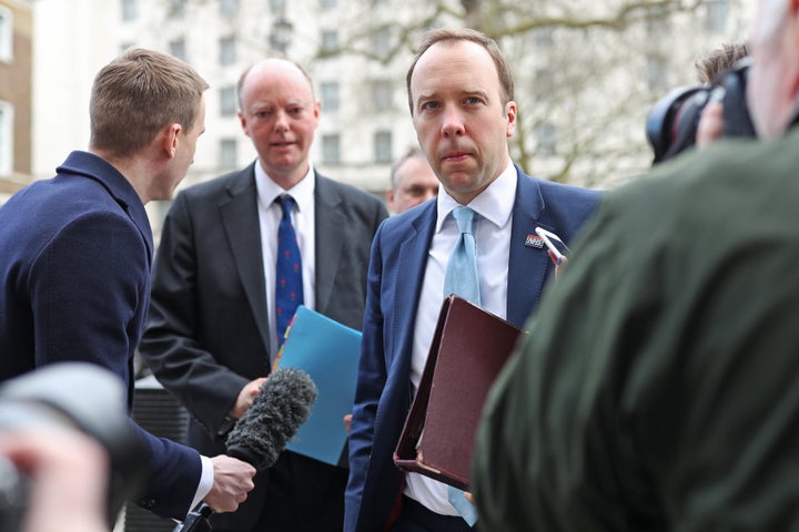 Health Secretary Matt Hancock (right) and Chief Medical Officer Chris Whitty (left) arrive at the Cabinet Office, Whitehall, London, for a meeting of the Government's emergency committee Cobra to discuss coronavirus.