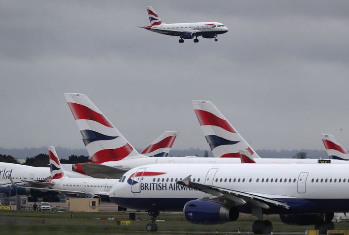 A British Airways plane comes in to land at Heathrow Airport in London as the airline announced that it has cancelled all flights to and from Italy which were scheduled today.