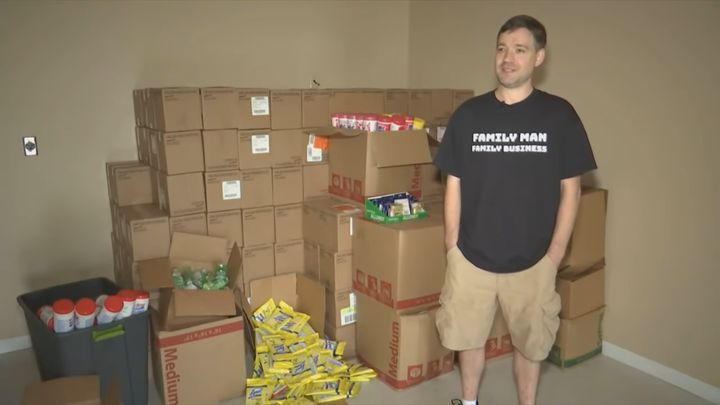 Matt Colvin stands with medical supplies that he said he purchased from stores in Tennessee and Kentucky to sell online for a profit.