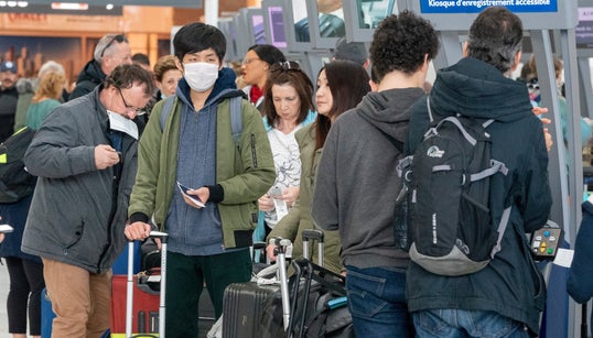 Travellers At Pearson Lament Lack Of COVID-19 Preventative