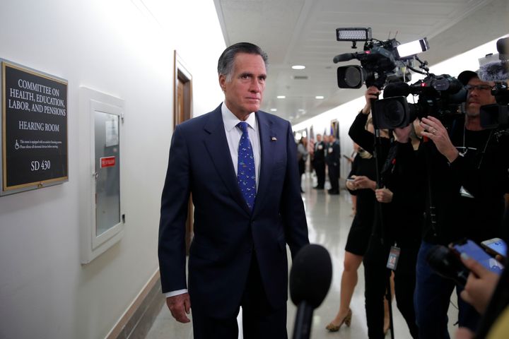 Sen. Mitt Romney (R-Utah) pauses to speak to media before a briefing on the coronavirus outbreak on March, 12, 2020.