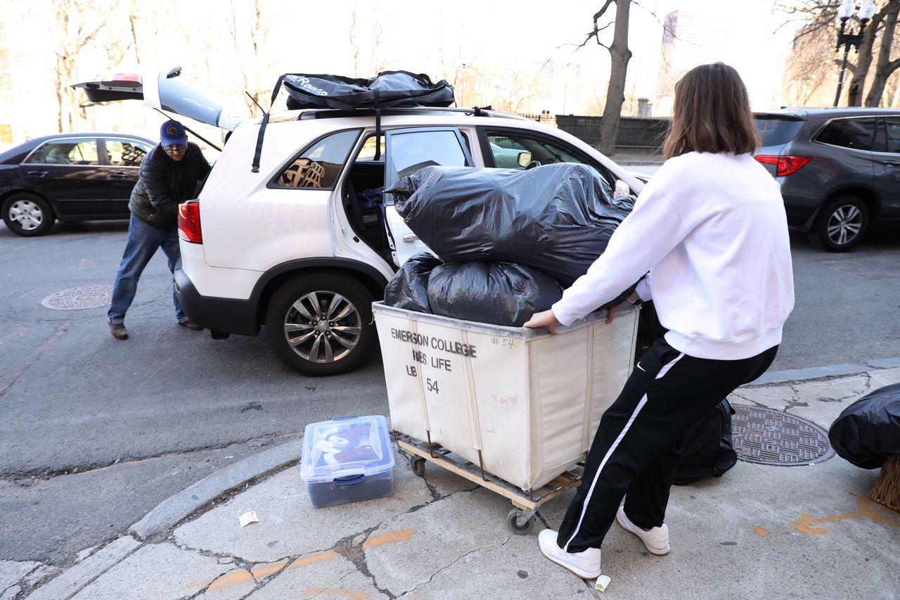 Emerson College student Mallory Shofi moved out of her dorm on Sunday after the Boston school, along with other area universities, shut down as part of the efforts to to stop the spread of the coronavirus. Classes will move online.