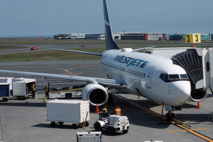 A WestJet airplane is shown at the St. John's International Airport on July 31, 2019.