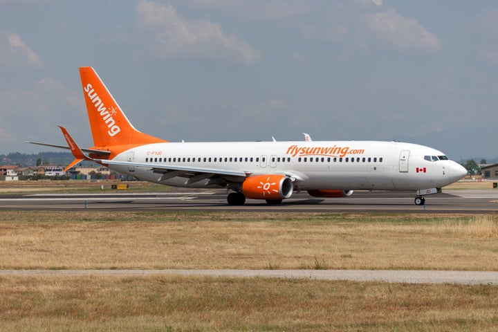 A Sunwing Airlines Boeing 737-800 landing at Verona Villafranca airport in July 2019. 