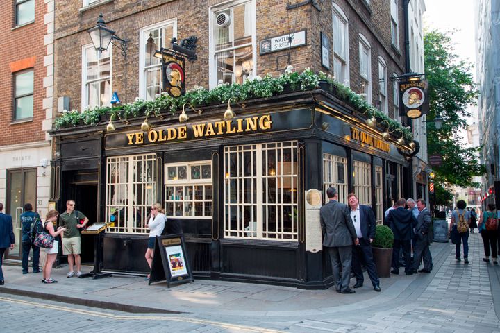 People outside Ye Olde Waitling pub, London, England, United Kingdom.