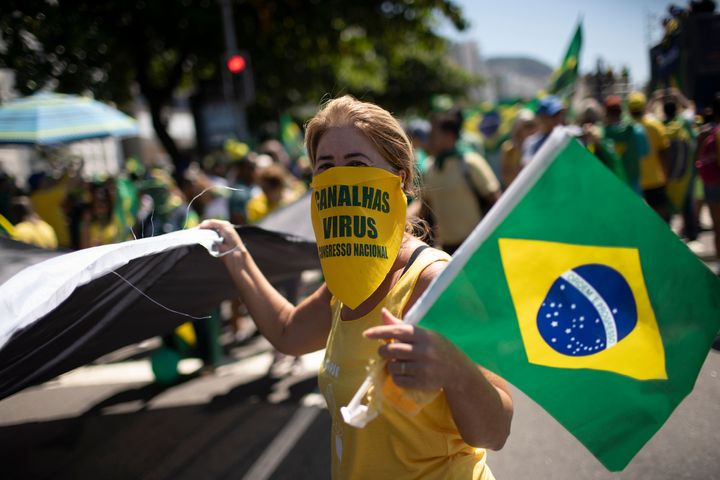 Supporters of Brazilian President Jair Bolsonaro rally on Copacabana beach in Rio de Janeiro, Brazil, on March 15, 2020.