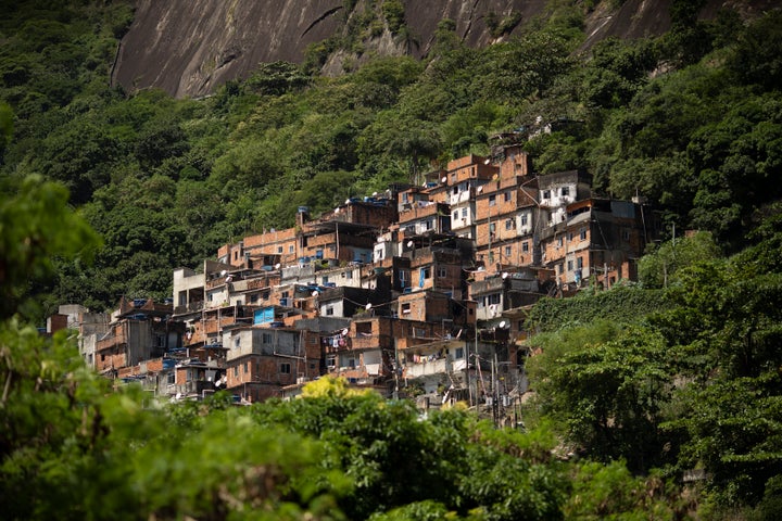 The Rocinha favela stands out from a hillside in Rio de Janeiro, Brazil, on March 16, 2020. Rocinha, Brazil's largest favela, is home to about 70,000 people, as of the latest census. Brazil's neglect of favela residents could make favelas hot spots for outbreaks of COVID-19.