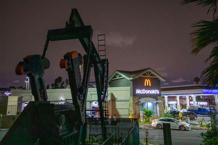 Pump jacks draw crude oil from the Long Beach Oil Field near Signal Hill, California.