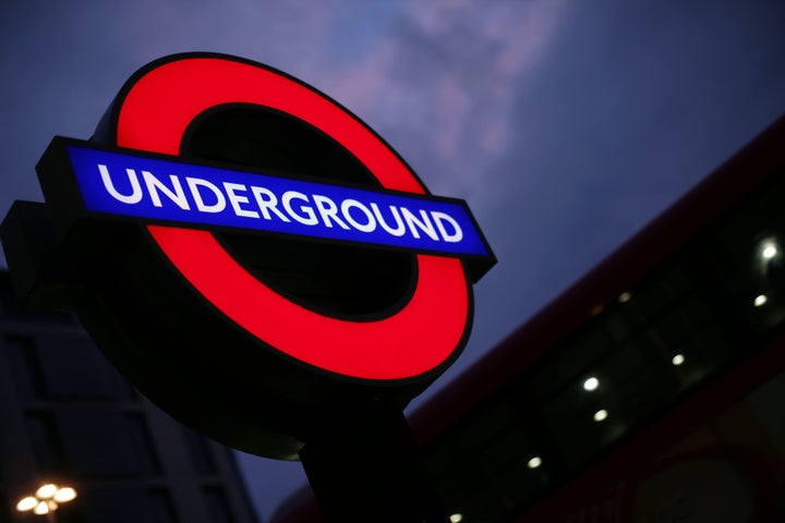 A London Underground sign against the night sky. Dozens of stations on the Tube network could be closed from Thursday following the outbreak of Covid-19.