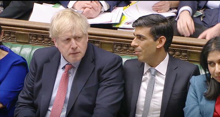 Prime Minister Boris Johnson (left) alongside Chancellor Rishi Sunak during Prime Minister's Questions in the House of Commons, London.