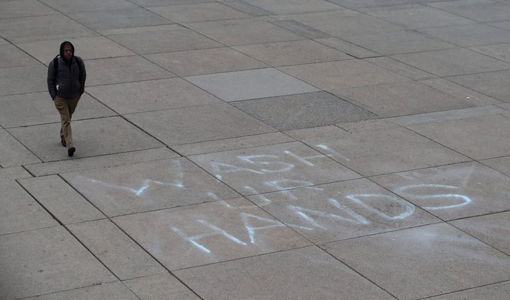 "Wash ur Hands" reads a message at Nathan Phillips Square at Toronto City Hall on March 19, 2020.